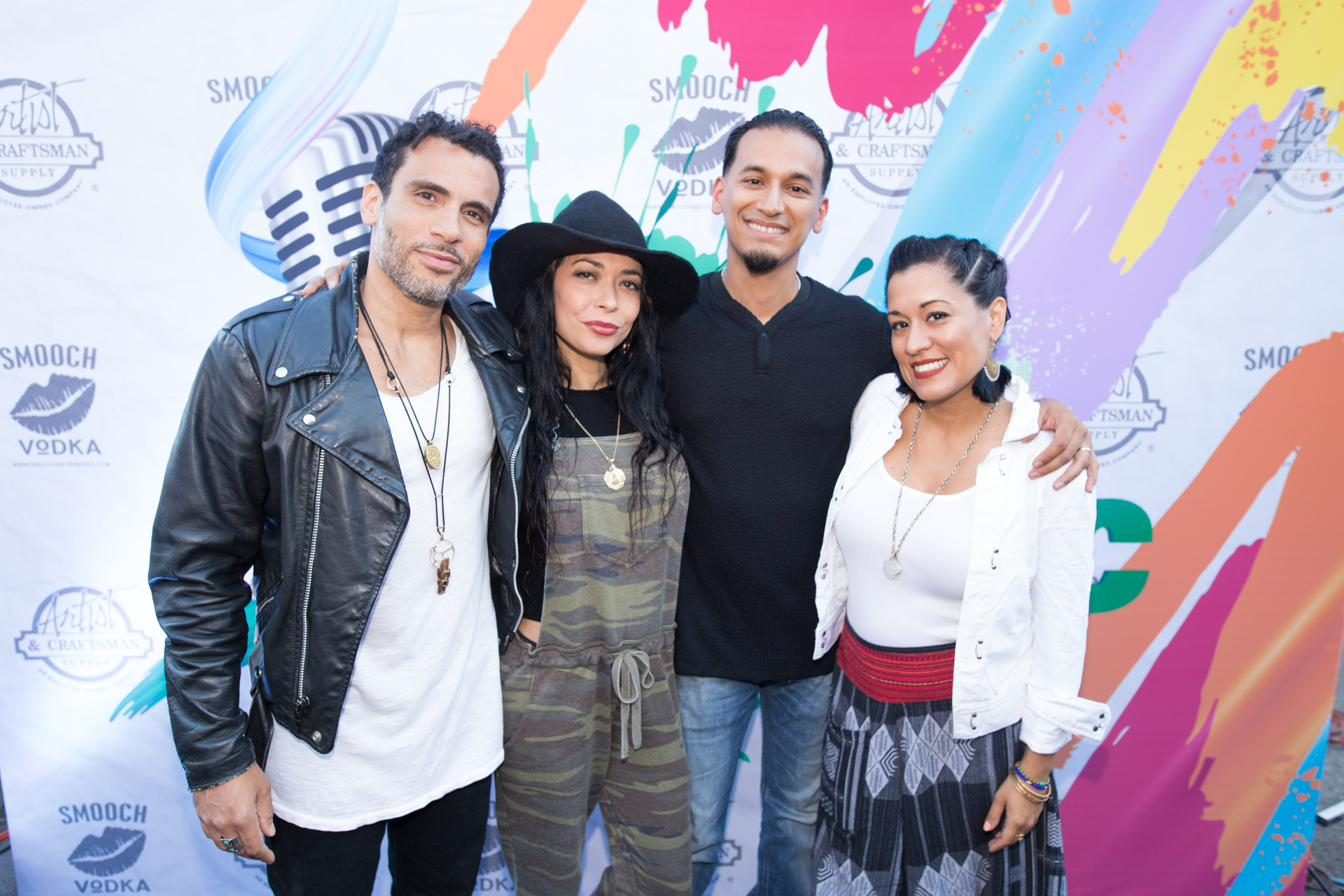 Goya Robles with fellow artists before a mural at Paint The Mic